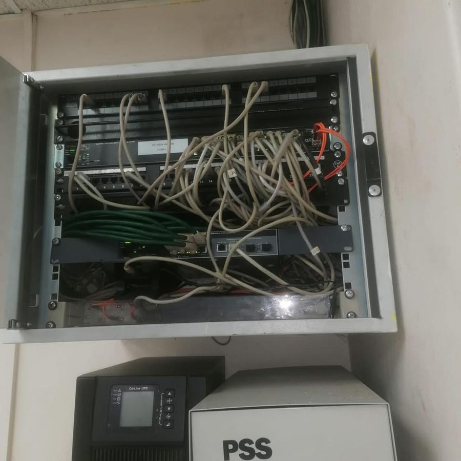 Network cabinet before cleanup